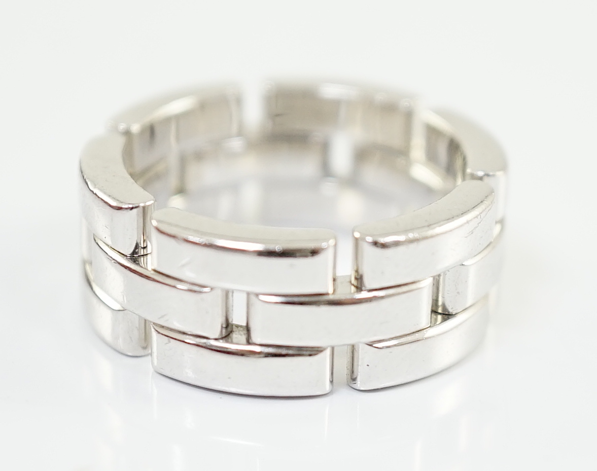 A modern Cartier 18ct white gold segmental band